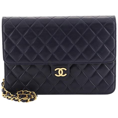 chanel small black clutch|Chanel vintage clutch with chain.